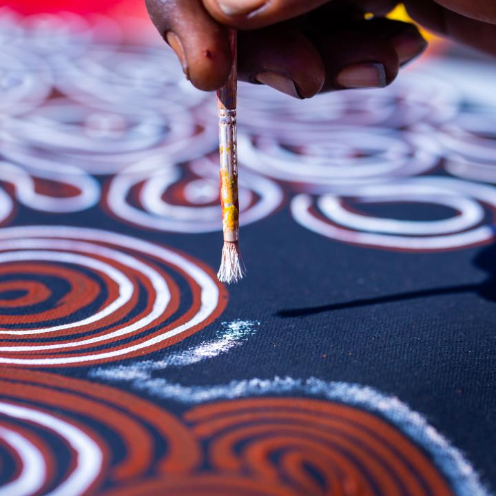 hand with paintbrush