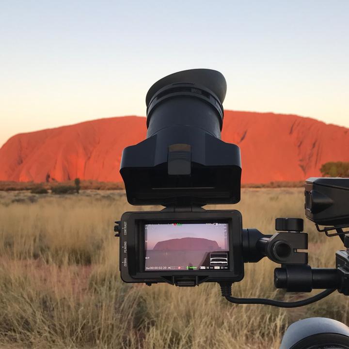 camera in front of Uluru